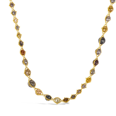 Handcrafted necklace featuring multi-colored diamonds strung in 18k yellow gold chain that increase in size and then decrease along the necklace.