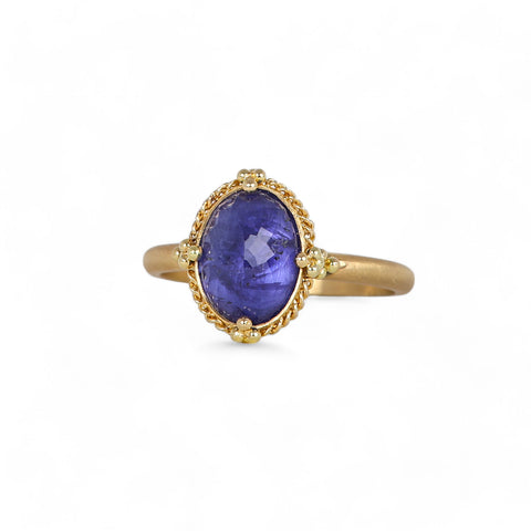 Oval tanzanite ring on white