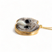 Sand Rose necklace in the shape of an owl side view.