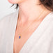 Petite tanzanite necklace side view