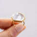 Rock Crystal ring being held.