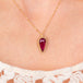 Ruby and gold necklace on model