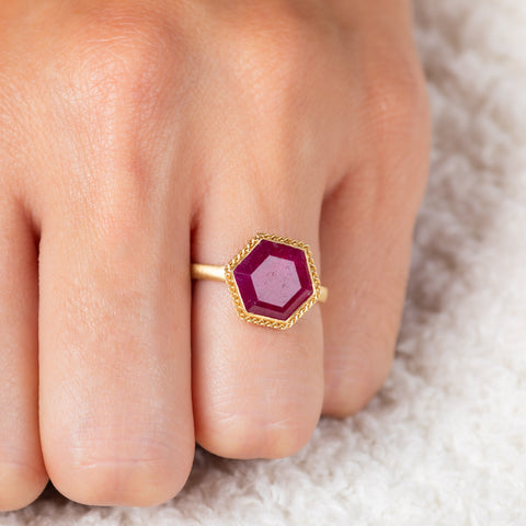 Ruby and gold ring on model
