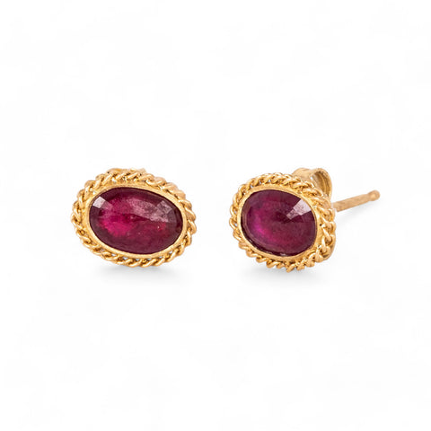Ruby and gold stud earrings