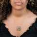 Rutilated Quartz and 18k Gold necklace on model