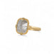 Side view of an 18k yellow gold and silver diamond ring.