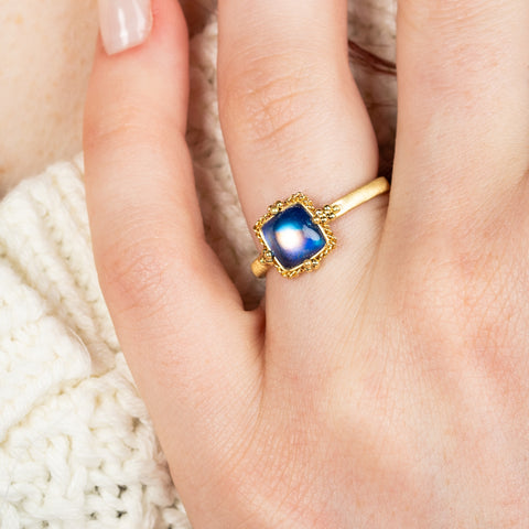Square moonstone ring on model side angle