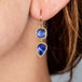 tanzanite drop earrings on model