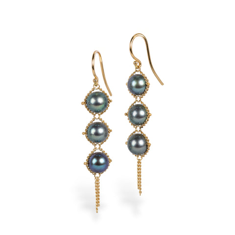 Blue akoya pearl earrings on white