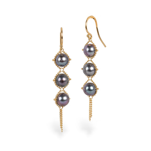 Grey akoya pearl earrings on white