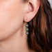 Blue akoya pearl earrings on model