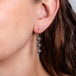 Grey akoya pearl earrings on model