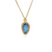 Gold necklace with a carved moonstone pendant in the shape of a tiny leaf on a white background