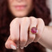 Carved tourmaline parrot ring on model