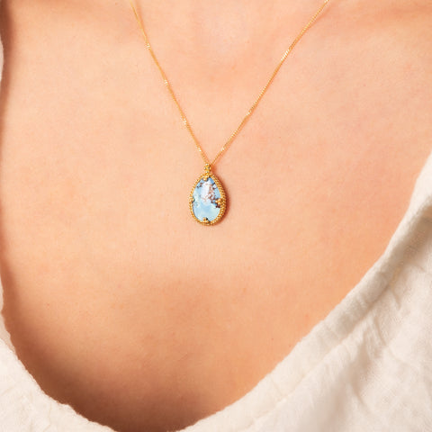 Turquoise necklace on model side view