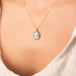 Turquoise necklace on model side view