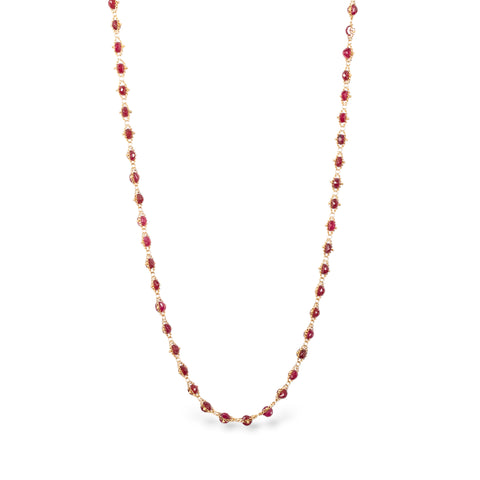Woven ruby necklace on white background