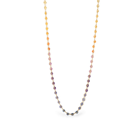 Hand woven sunrise necklace on white background