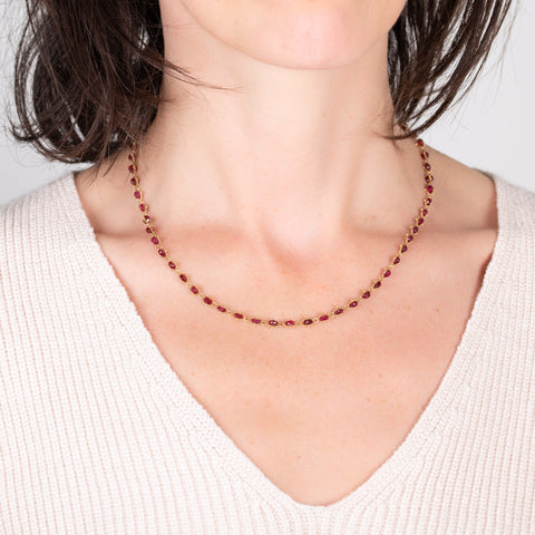 Woven ruby necklace on a model