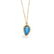 Hand-carved leaf pendant from a glowing blue Moonstone, encased in a unique handmade gold bezel with braided detail. Suspended on an 18k yellow gold chain, offering meticulous craftsmanship and elegance. Handmade in New York.