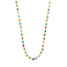 A multi-colored woven gemstone bead necklace features multiple gemstones including Aquamarine, Opal, apatite, Moonstone, Tanzanite, Carnelian, Tourmaline, Amazonite, Rhodochrosite, Chalcedony and Jade. The stones are set in a long 18k yellow gold chain.