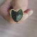 Video of a black cat ring in 18k yellow gold and onyx.