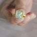 A video of an 18k yellow gold and silver diamond ring.