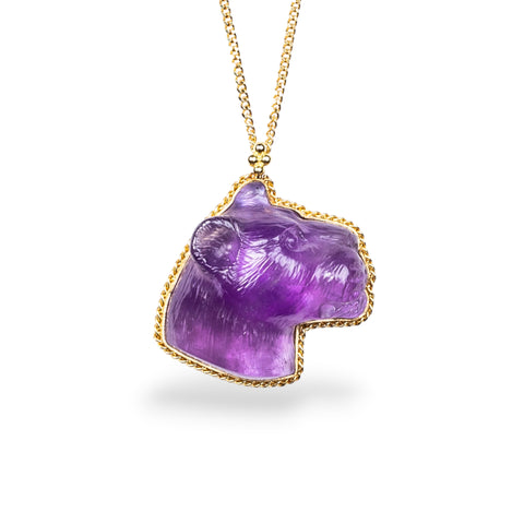 Amethyst panther pendant on an 18K yellow gold chain. Set in a handmade gold bezel with braided detail. Handmade in New York.