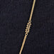 A model wears an 18k yellow gold chain necklace with rows of champagne diamond stations woven throughout.