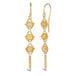 A pair of long 18k yellow gold earrings are crafted with opal beads suspended in delicate chain. The earrings are fastened with French hook closures.