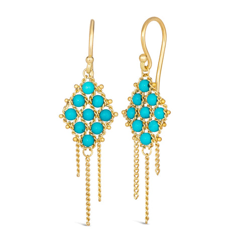 Small turquoise beads are woven with 18k yellow gold chain in a diamond lattice pattern and have three dangling chains. The earrings are fastened with french hook closures.