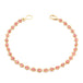 An 18k yellow gold chain bracelet with a row of small Spinel gemstone beads. Finished with a gold lobster clasp.