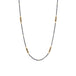 Stations of black diamonds set in 18k gold are dotted throughout a short oxidized sterling silver chain.