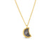 A small charcoal colored diamond cut in the shape of a crescent is set in an 18k yellow gold chain wrapped bezel. The pendant hangs on a delicate chain.