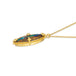 A side view of an irregular oval shaped opal and wood pendant is set in an 18k yellow gold chain wrapped bezel with four beaded prongs. The pendant hangs on a short delicate chain.
