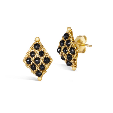 A pair of 18k yellow gold earrings is crafted with black diamonds woven into a diamond lattice pattern with delicate chain that is fastened with a post closure.