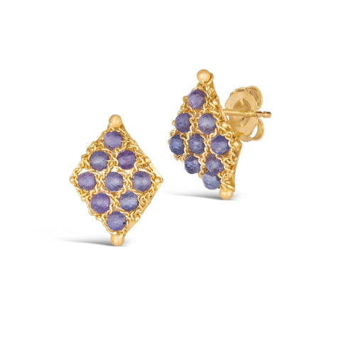A pair of 18k yellow gold earrings is crafted with tanzanite stones woven into a diamond lattice pattern with delicate chain that is fastened with a post closure.