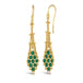 A pair of 18k yellow gold earrings is crafted with emerald beads woven into a diamond lattice pattern with delicate chain that is suspended from a french hook closure.