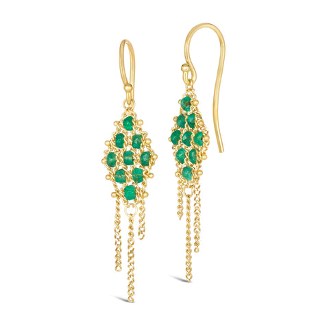 Small green emeralds are woven with 18k yellow gold chain in a diamond lattice pattern and have three dangling chains. The earrings are fastened with french hook closures.