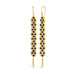 A pair of long black diamond earrings features a woven lattice pattern and two dangling chains at the bottom of the earring. The earrings fasten with french hook closures.