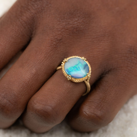 18k Gold Boulder Opal ring on model