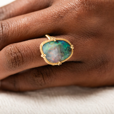 18k Gold Boulder Opal ring on model