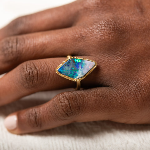 18k Gold Boulder Opal ring on model