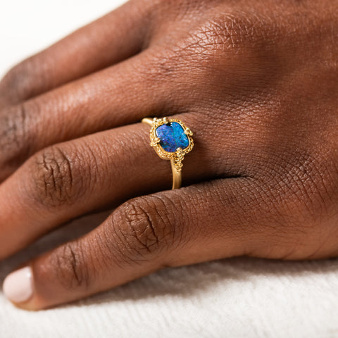 18k Gold Boulder Opal ring on model