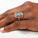 18k Gold Boulder Opal ring on model