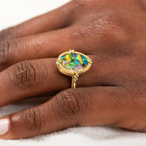 18k Gold Boulder Opal ring on model