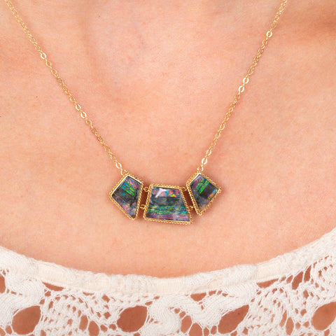 Boulder opal necklace on model