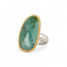 Handmade emerald ring with a gold bezel and sterling silver band