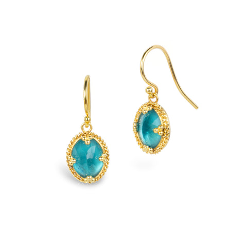 A pair of gold drop earrings with vivid blue Apatite gemstones in textured gold settings, shown on a plain white background.