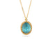 A gold chain necklace with an oval pendant featuring an apatite stone set in an 18k bezel, shown against a plain white background.